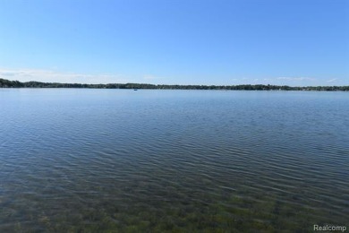 OUTSTANDING VIEWS from this all sports, Lake Nepessing lakefront on Lapeer Country Club in Michigan - for sale on GolfHomes.com, golf home, golf lot