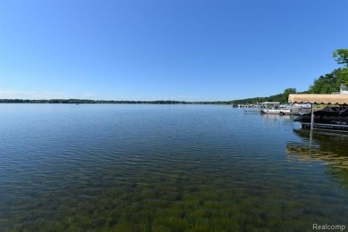 OUTSTANDING VIEWS from this all sports, Lake Nepessing lakefront on Lapeer Country Club in Michigan - for sale on GolfHomes.com, golf home, golf lot