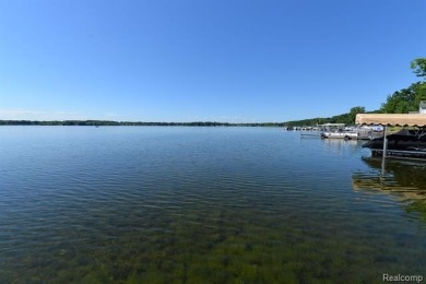 OUTSTANDING VIEWS from this all sports, Lake Nepessing lakefront on Lapeer Country Club in Michigan - for sale on GolfHomes.com, golf home, golf lot