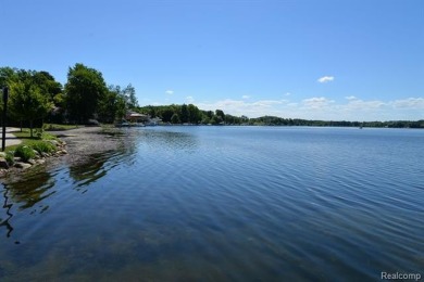 OUTSTANDING VIEWS from this all sports, Lake Nepessing lakefront on Lapeer Country Club in Michigan - for sale on GolfHomes.com, golf home, golf lot