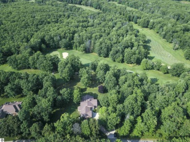 This contemporary custom built home is located on the 8th hole on The Dream in Michigan - for sale on GolfHomes.com, golf home, golf lot