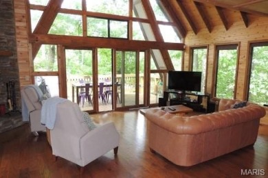 Private setting on lake Silveratta,  newer style custom chalet on Innsbrook Resort Golf Course in Missouri - for sale on GolfHomes.com, golf home, golf lot