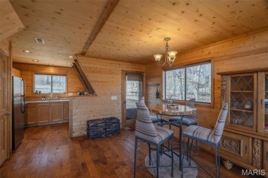 Private setting on lake Silveratta,  newer style custom chalet on Innsbrook Resort Golf Course in Missouri - for sale on GolfHomes.com, golf home, golf lot