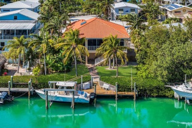 Nestled on tranquil Flamingo Island, this impeccably maintained on Sombrero Golf and Country Club in Florida - for sale on GolfHomes.com, golf home, golf lot