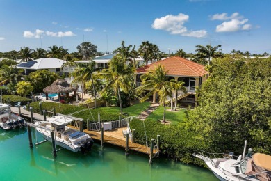 Nestled on tranquil Flamingo Island, this impeccably maintained on Sombrero Golf and Country Club in Florida - for sale on GolfHomes.com, golf home, golf lot