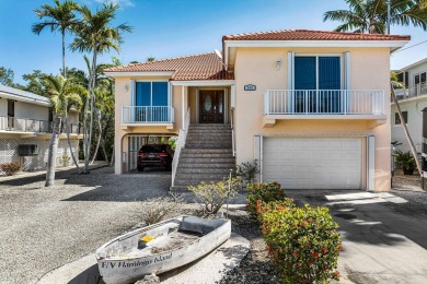 Nestled on tranquil Flamingo Island, this impeccably maintained on Sombrero Golf and Country Club in Florida - for sale on GolfHomes.com, golf home, golf lot