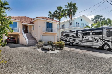 Nestled on tranquil Flamingo Island, this impeccably maintained on Sombrero Golf and Country Club in Florida - for sale on GolfHomes.com, golf home, golf lot