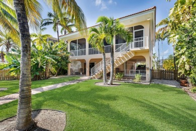 Nestled on tranquil Flamingo Island, this impeccably maintained on Sombrero Golf and Country Club in Florida - for sale on GolfHomes.com, golf home, golf lot