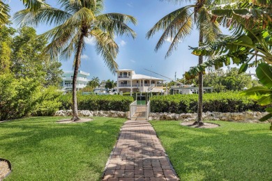 Nestled on tranquil Flamingo Island, this impeccably maintained on Sombrero Golf and Country Club in Florida - for sale on GolfHomes.com, golf home, golf lot