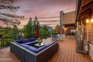 Cabin style home with views of Mt. Elden. You feel like you are on Continental Country Club in Arizona - for sale on GolfHomes.com, golf home, golf lot