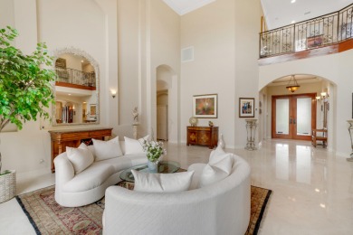 This gorgeous Mediterranean property in Bocaire Country Club is on Bocaire Country Club in Florida - for sale on GolfHomes.com, golf home, golf lot