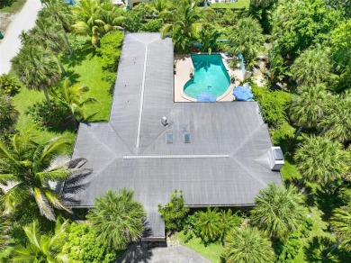 Elegant Mid-Century Modern Treasure with Timeless on Crane Creek Reserve Golf Club in Florida - for sale on GolfHomes.com, golf home, golf lot