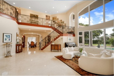 This gorgeous Mediterranean property in Bocaire Country Club is on Bocaire Country Club in Florida - for sale on GolfHomes.com, golf home, golf lot