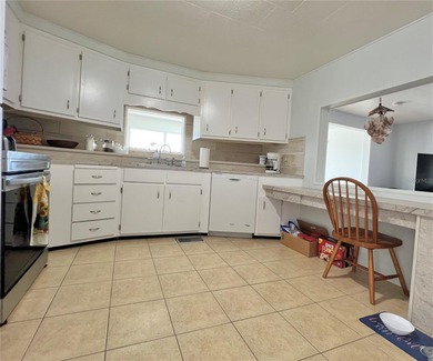 Welcome to this charming 2-bedroom, 2-bath home in the highly on Fairway Village Golf Course in Florida - for sale on GolfHomes.com, golf home, golf lot