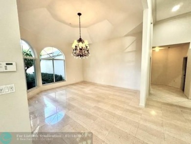 Allow yourself to be immersed in complete serenity and peace on Weston Hills Country Club in Florida - for sale on GolfHomes.com, golf home, golf lot