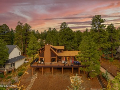 Cabin style home with views of Mt. Elden. You feel like you are on Continental Country Club in Arizona - for sale on GolfHomes.com, golf home, golf lot