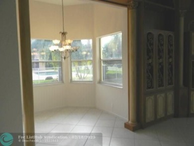 Allow yourself to be immersed in complete serenity and peace on Weston Hills Country Club in Florida - for sale on GolfHomes.com, golf home, golf lot