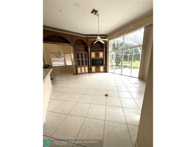 Allow yourself to be immersed in complete serenity and peace on Weston Hills Country Club in Florida - for sale on GolfHomes.com, golf home, golf lot