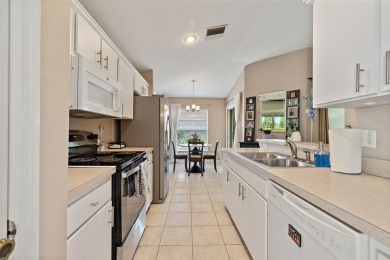 Welcome to this delightful home perfectly designed for ease and on Lexington Oaks Golf Club in Florida - for sale on GolfHomes.com, golf home, golf lot
