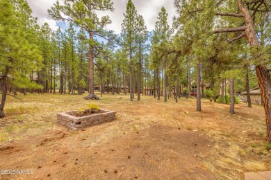 Cabin style home with views of Mt. Elden. You feel like you are on Continental Country Club in Arizona - for sale on GolfHomes.com, golf home, golf lot