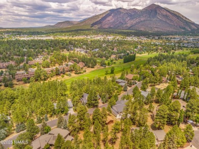Cabin style home with views of Mt. Elden. You feel like you are on Continental Country Club in Arizona - for sale on GolfHomes.com, golf home, golf lot