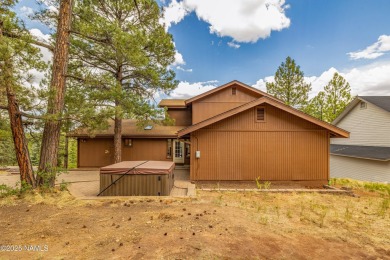Cabin style home with views of Mt. Elden. You feel like you are on Continental Country Club in Arizona - for sale on GolfHomes.com, golf home, golf lot