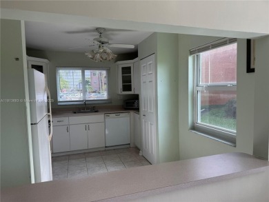 Discover the potential of this spacious 2 BR, 2 BTH corner condo on Sunrise Lakes Phase III in Florida - for sale on GolfHomes.com, golf home, golf lot