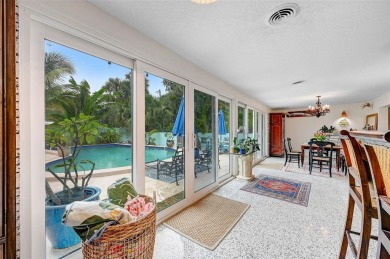 Elegant Mid-Century Modern Treasure with Timeless on Crane Creek Reserve Golf Club in Florida - for sale on GolfHomes.com, golf home, golf lot