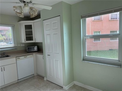 Discover the potential of this spacious 2 BR, 2 BTH corner condo on Sunrise Lakes Phase III in Florida - for sale on GolfHomes.com, golf home, golf lot