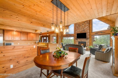 Cabin style home with views of Mt. Elden. You feel like you are on Continental Country Club in Arizona - for sale on GolfHomes.com, golf home, golf lot