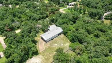 Hangar Home in Hilltop Lakes, Normangee, TX.  Enjoy Resort Style on Hilltop Lakes Resort Golf Club in Texas - for sale on GolfHomes.com, golf home, golf lot