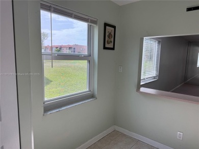 Discover the potential of this spacious 2 BR, 2 BTH corner condo on Sunrise Lakes Phase III in Florida - for sale on GolfHomes.com, golf home, golf lot