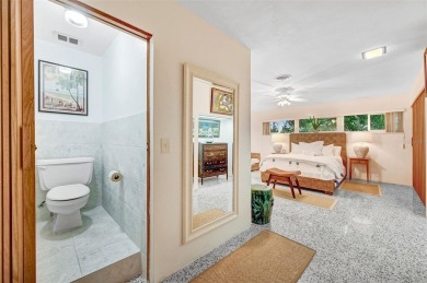 Elegant Mid-Century Modern Treasure with Timeless on Crane Creek Reserve Golf Club in Florida - for sale on GolfHomes.com, golf home, golf lot