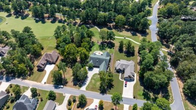 Welcome to your dream home, perfectly nestled on nearly an acre on The Patriot Golf Club At Grand Harbor in South Carolina - for sale on GolfHomes.com, golf home, golf lot