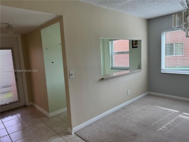 Discover the potential of this spacious 2 BR, 2 BTH corner condo on Sunrise Lakes Phase III in Florida - for sale on GolfHomes.com, golf home, golf lot