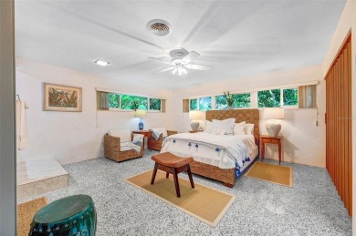Elegant Mid-Century Modern Treasure with Timeless on Crane Creek Reserve Golf Club in Florida - for sale on GolfHomes.com, golf home, golf lot