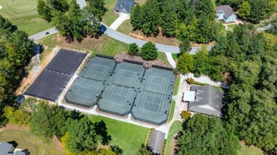 Welcome to your dream home, perfectly nestled on nearly an acre on The Patriot Golf Club At Grand Harbor in South Carolina - for sale on GolfHomes.com, golf home, golf lot