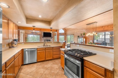 Cabin style home with views of Mt. Elden. You feel like you are on Continental Country Club in Arizona - for sale on GolfHomes.com, golf home, golf lot
