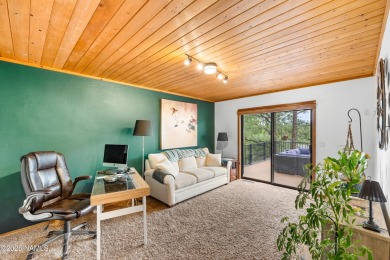 Cabin style home with views of Mt. Elden. You feel like you are on Continental Country Club in Arizona - for sale on GolfHomes.com, golf home, golf lot