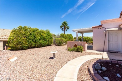 Tucked in the heart of Sun City Summerlin, this sought-after on Highland Falls Golf Club in Nevada - for sale on GolfHomes.com, golf home, golf lot