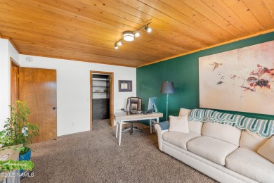 Cabin style home with views of Mt. Elden. You feel like you are on Continental Country Club in Arizona - for sale on GolfHomes.com, golf home, golf lot
