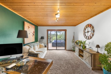 Cabin style home with views of Mt. Elden. You feel like you are on Continental Country Club in Arizona - for sale on GolfHomes.com, golf home, golf lot