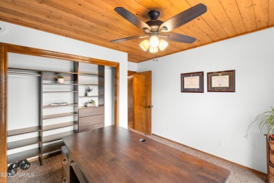 Cabin style home with views of Mt. Elden. You feel like you are on Continental Country Club in Arizona - for sale on GolfHomes.com, golf home, golf lot
