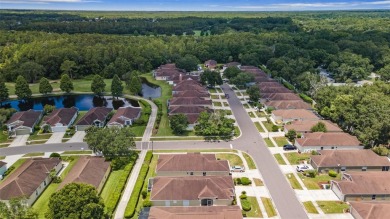 Welcome to this delightful home perfectly designed for ease and on Lexington Oaks Golf Club in Florida - for sale on GolfHomes.com, golf home, golf lot