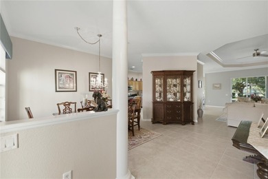 Experience refined Florida living in this beautifully enhanced on Candler Hills Golf and Country Club in Florida - for sale on GolfHomes.com, golf home, golf lot