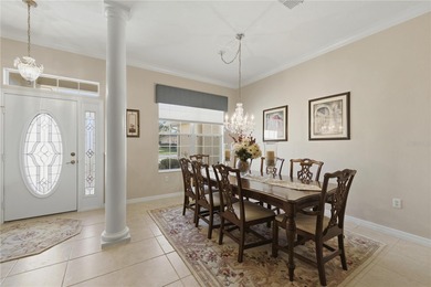 Experience refined Florida living in this beautifully enhanced on Candler Hills Golf and Country Club in Florida - for sale on GolfHomes.com, golf home, golf lot