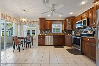 Experience the perfect blend of STYLE, COMFORT, and FLORIDA on Herons Glen Golf and Country Club in Florida - for sale on GolfHomes.com, golf home, golf lot