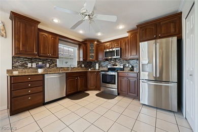 Experience the perfect blend of STYLE, COMFORT, and FLORIDA on Herons Glen Golf and Country Club in Florida - for sale on GolfHomes.com, golf home, golf lot