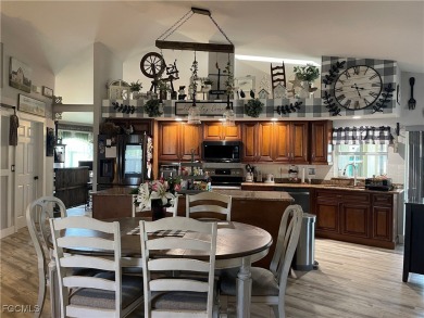 Virtually a full remodel since ownership on this very inviting on Riverbend Golf and Country Club in Florida - for sale on GolfHomes.com, golf home, golf lot
