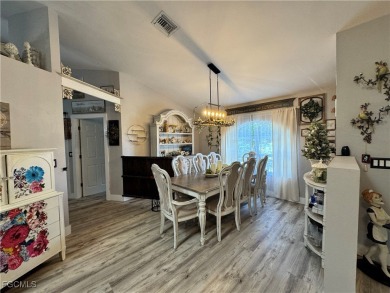 Virtually a full remodel since ownership on this very inviting on Riverbend Golf and Country Club in Florida - for sale on GolfHomes.com, golf home, golf lot